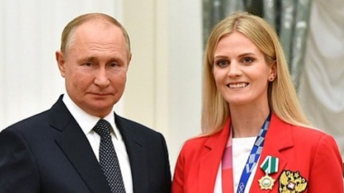Rosyjska zawodniczka z prezydentem Putinem