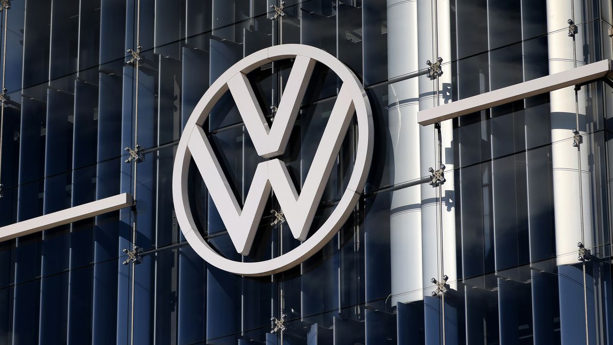 The logo of Volkswagen AG (VW) on a building in the automaker's headquarters and auto plant complex in Wolfsburg, Germany, on Tuesday, Feb. 28, 2023. Volkswagen wants to remain a strong player in Europe and China, but in the face of growing geopolitical tensions and an increasingly complex regulatory environment, the German carmaker is looking beyond the US for markets with growth potential. Photographer: Krisztian Bocsi/Bloomberg via Getty Images