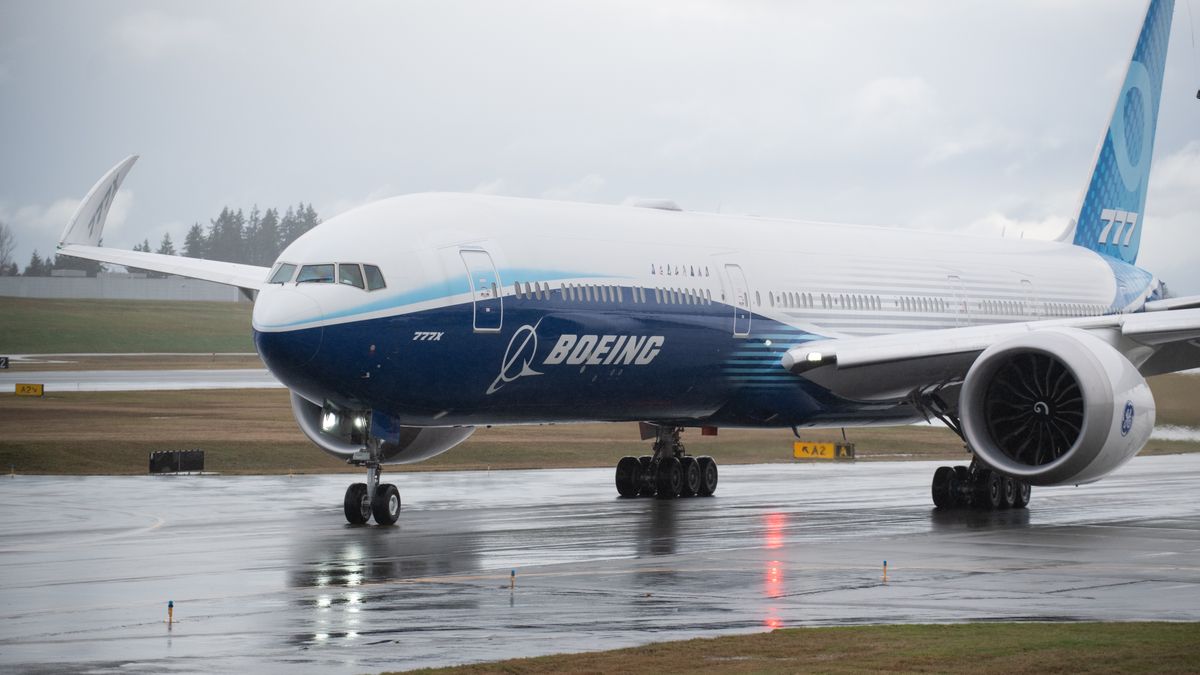 A Boeing Co. 777X airplane taxis on the runway at the Paine Field airport in Mukilteo, Washington, U.S., on  Friday, Jan. 24, 2020. Boeing Co.'s newest plane is preparing to spread its gargantuan wingsso long the tips are hingedand rumble into the skies over the Washington factory complex constructed a half century ago for the original jumbo jet. Photographer: Chona Kasinger/Bloomberg via Getty Images