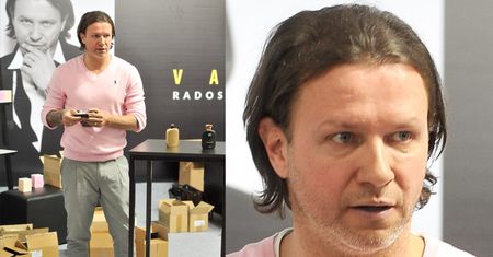 Majdan w różowym sweterku sprzedaje perfumy na targach kosmetycznych (ZDJĘCIA)