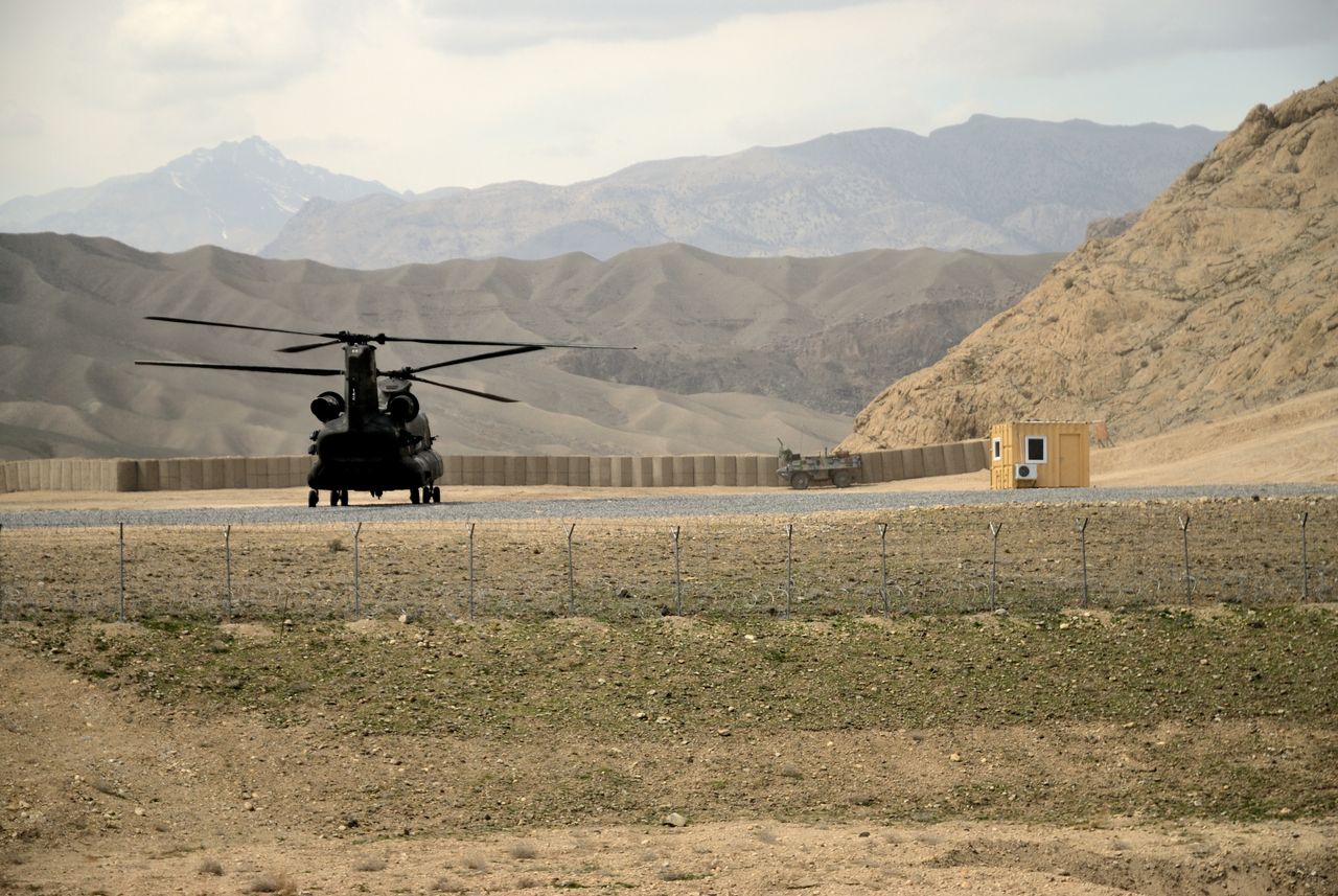 The military helicopter lands on the Base.