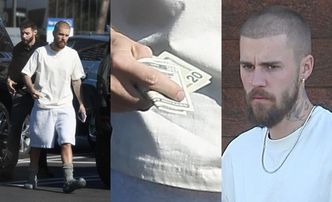 Brodaty Justin Bieber parkuje na miejscu na niepełnosprawnych i pędzi z plikiem pieniędzy po kawusię