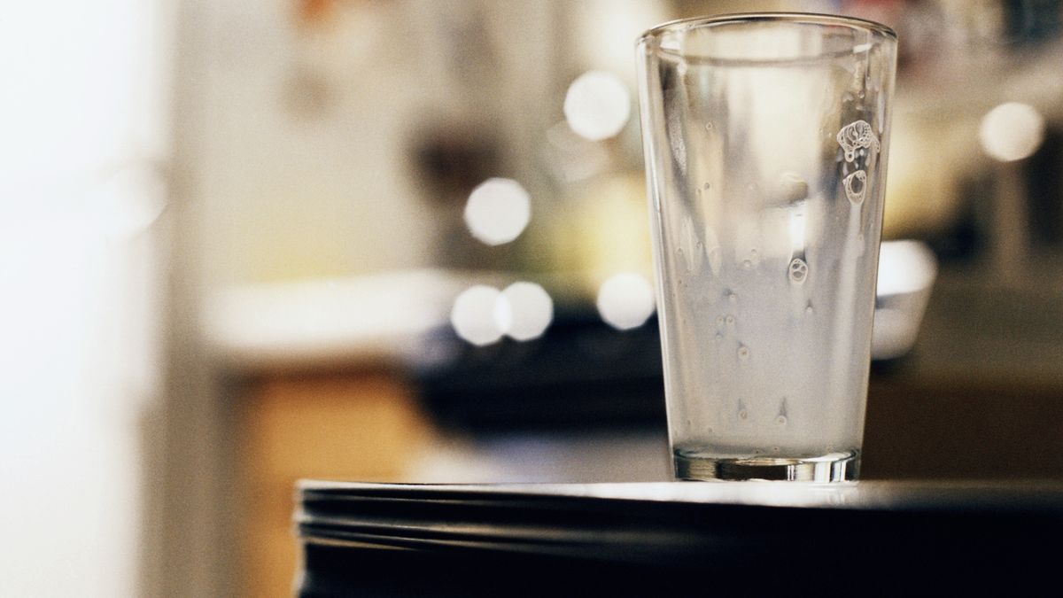 Empty glass of milk on table, close-upJim Bastardo