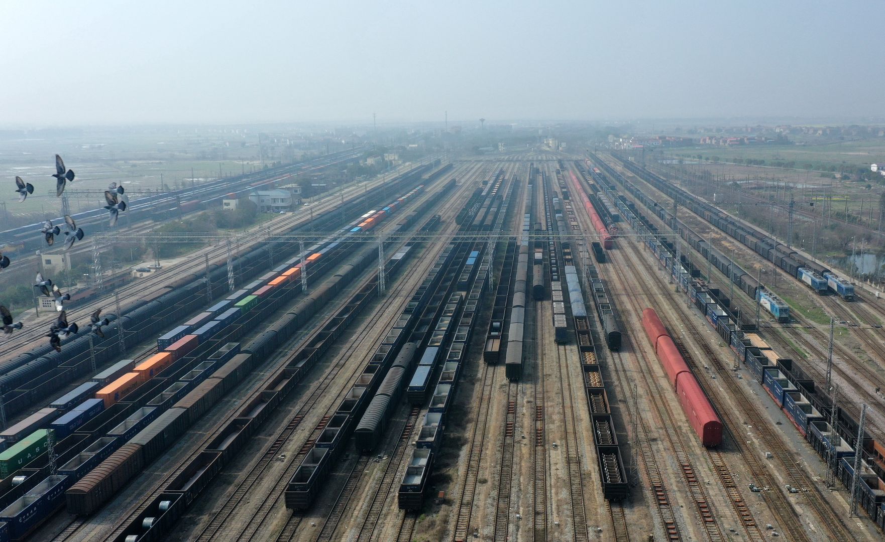 NANCHANG, CHINA - MARCH 7, 2024 - Cargo train loaded with spring ploughing materials prepare to leave the Xiangtangxi Marshalling Yard of the Southern Railway in Nanchang, Jiangxi province, China, March 7, 2024. (Photo credit should read CFOTO/Future Publishing via Getty Images)