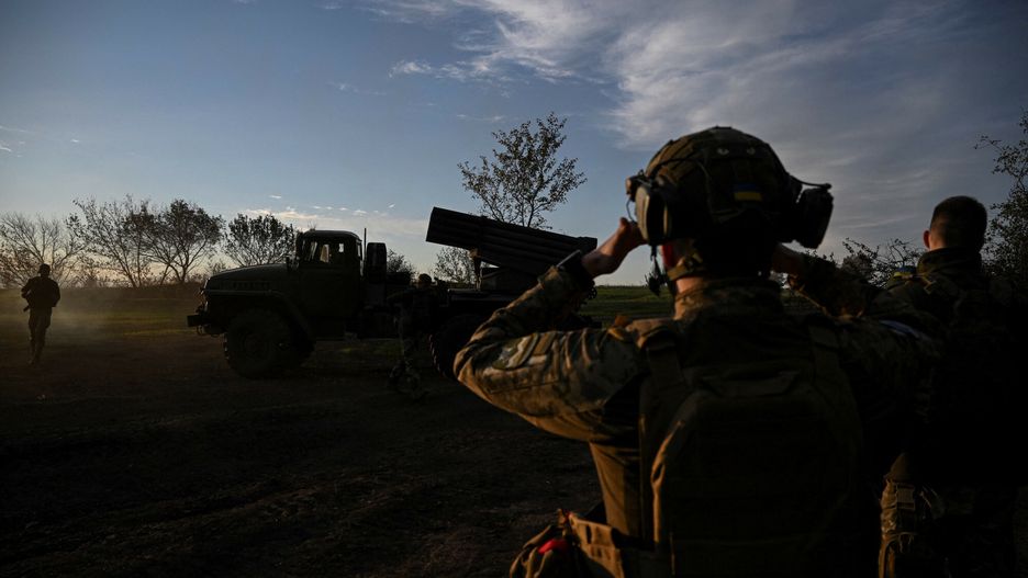 Temporary
Ukrainian soldiers stand next to a BM-21 'Grad' multiple rocket launcher in eastern Ukraine on September 22, 2022, amid the Russian invasion of Ukraine. (Photo by Juan BARRETO / AFP)
JUAN BARRETO