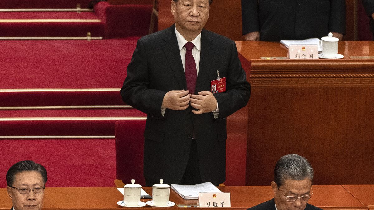 BEIJING, CHINA - MARCH 5: Chinese President Xi Jinping stands during the opening of the NPC, or National People's Congress, at the Great Hall of the People on March 5, 2024 in Beijing, China. China's annual political gathering known as the Two Sessions will convene leaders and lawmakers to set the government's agenda for domestic economic and social development for the year. (Photo by Kevin Frayer/Getty Images)