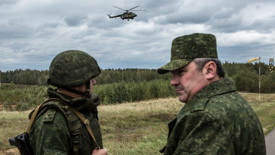 Zapad Joint Military Exercises Between Russia And Belarus
ASIPOVICHY, BELARUS - SEPTEMBER 18: Belarusian soldiers watching the Zapad 2017 military exercises at the Asipovichy military training ground on September 18, 2017 in in Asipovichy, Belarus. The joint military exercises between Belarus and Russia, last held four years ago, have raised alarm in the NATO-member countries to the west over concerns that as many as 100,000 troops may take part, well above the declared 12,700, and that it will serve as cover for Russia to move a permanent contingent of soldiers to Belarus or potentially launch incursions into neighboring countries. (Photo by Brendan Hoffman/Getty Images)
Brendan Hoffman
Politics, Diplomacy
