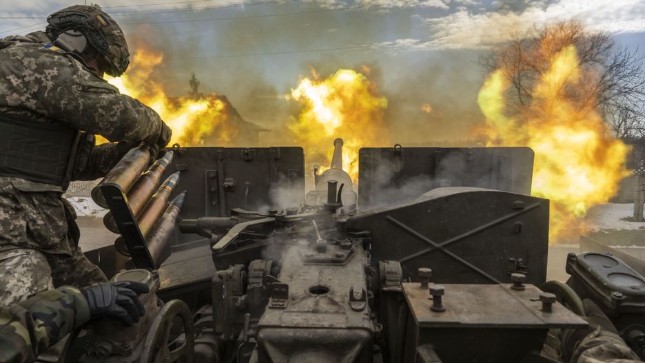 BAKHMUT, UKRAINE - APRIL 02: Ukrainian servicemen fire an artillery shell near the frontline area amid the Russia-Ukraine war, in Bakhmut, Ukraine on April 02, 2023. (Photo by Muhammed Enes Yildirim/Anadolu Agency via Getty Images)