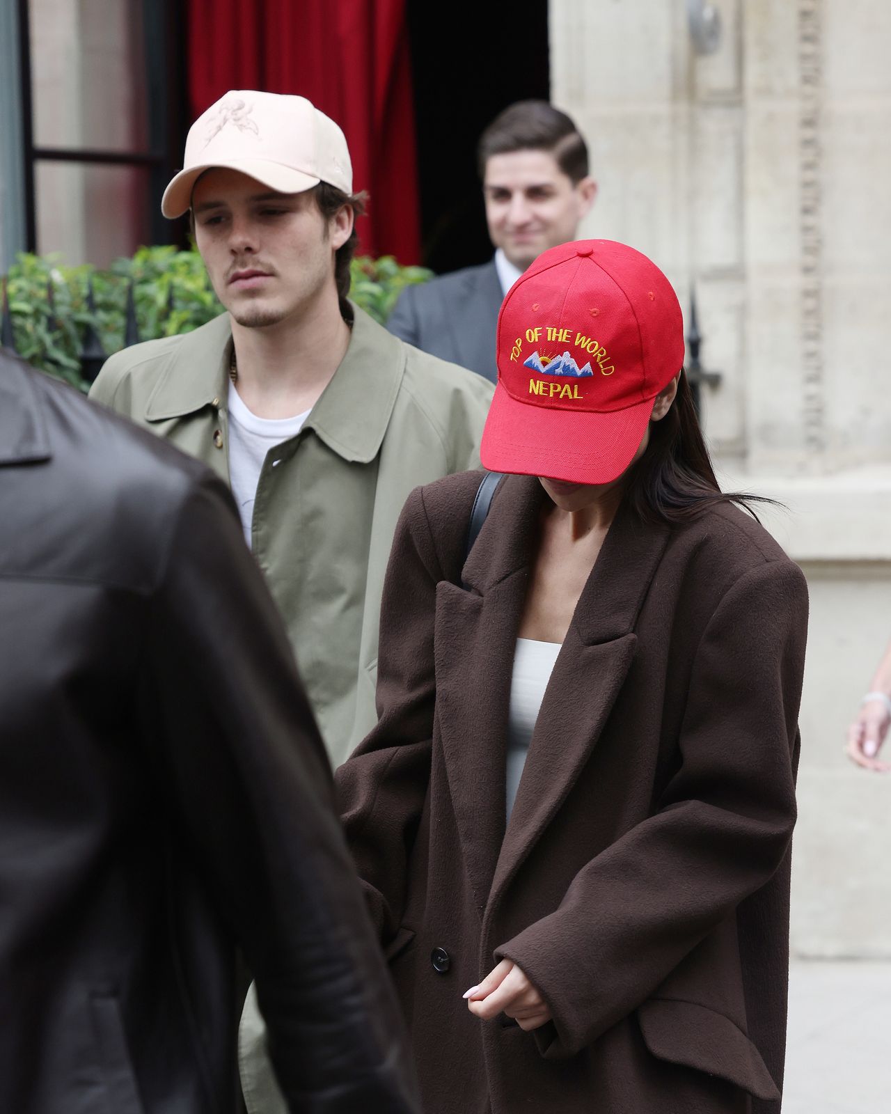 PARIS, FRANCE - SEPTEMBER 29: Cruz Beckham and Jackie Apostel checking out of their hotel during the Womenswear Spring/Summer 2025 as part of Paris Fashion Week on September 29, 2024 in Paris, France. (Photo by Neil Mockford/GC Images)