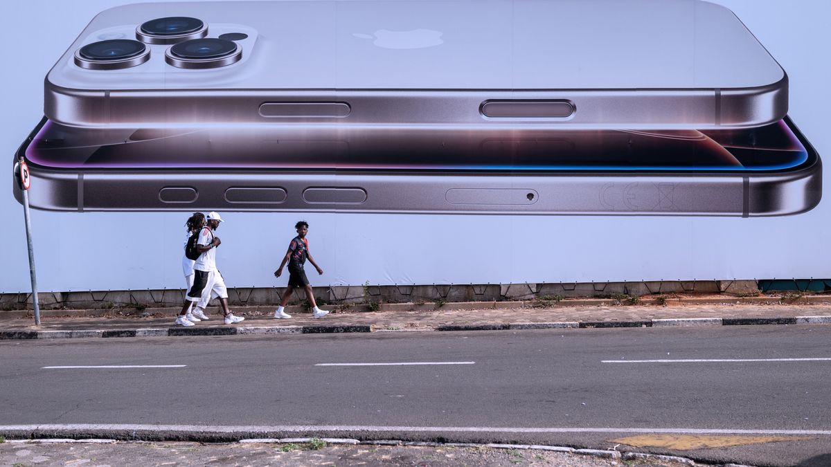 An Apple Inc. advertisement for iPhones on Oxford Road in Johannesburg, South Africa, on Sunday, Oct. 27, 2024. South Africa's improving economic prospects after years of lackluster growth will result in better fiscal metrics and may soon lead to an upgrade of its junk-rated debt, according to RMB Morgan Stanley. Photographer: Leon Sadiki/Bloomberg via Getty Images
