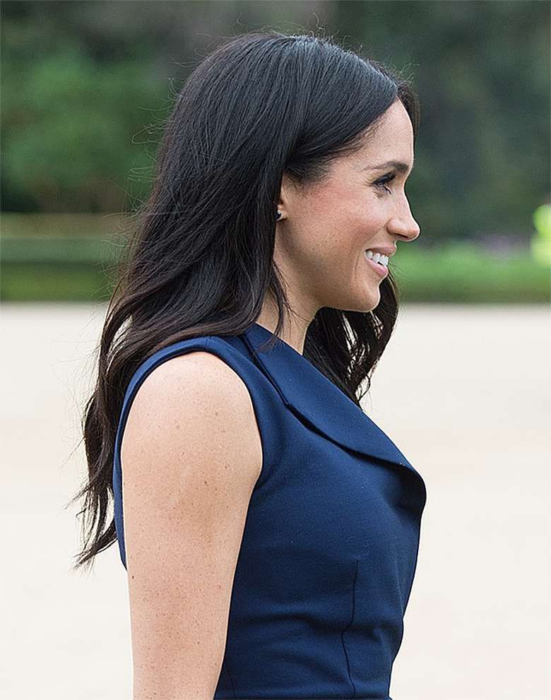 Meghan Markle z ciążowym brzuszkiem i książę Harry w Melbourne