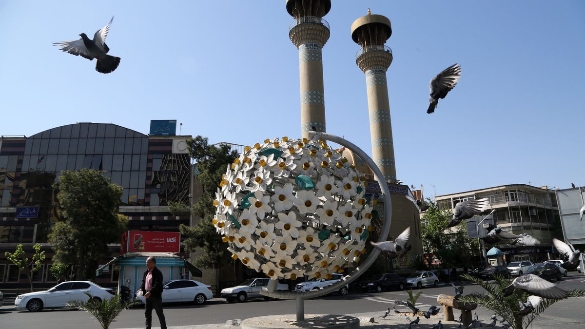 TEHRAN, IRAN - APRIL 19: People walk on the streets of Tehran as they continue their daily lives after the explosions heard in Isfahan and Tabriz cities of Iran, in Tehran, Iran on April 19, 2024. The sounds were heard due to the activation of the air defense system and the destruction of 3 mini unmanned aerial vehicles (UAV), Iranian media reported. (Photo by Fatemeh Bahrami/Anadolu via Getty Images)