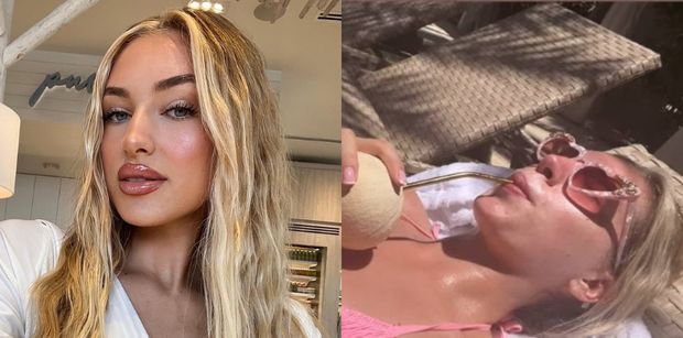 Naturalna Caroline Derpienski eksponuje sylwetkę w różowym bikini, sącząc kokosowego drinka