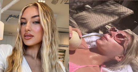 Naturalna Caroline Derpienski eksponuje sylwetkę w różowym bikini, sącząc kokosowego drinka
