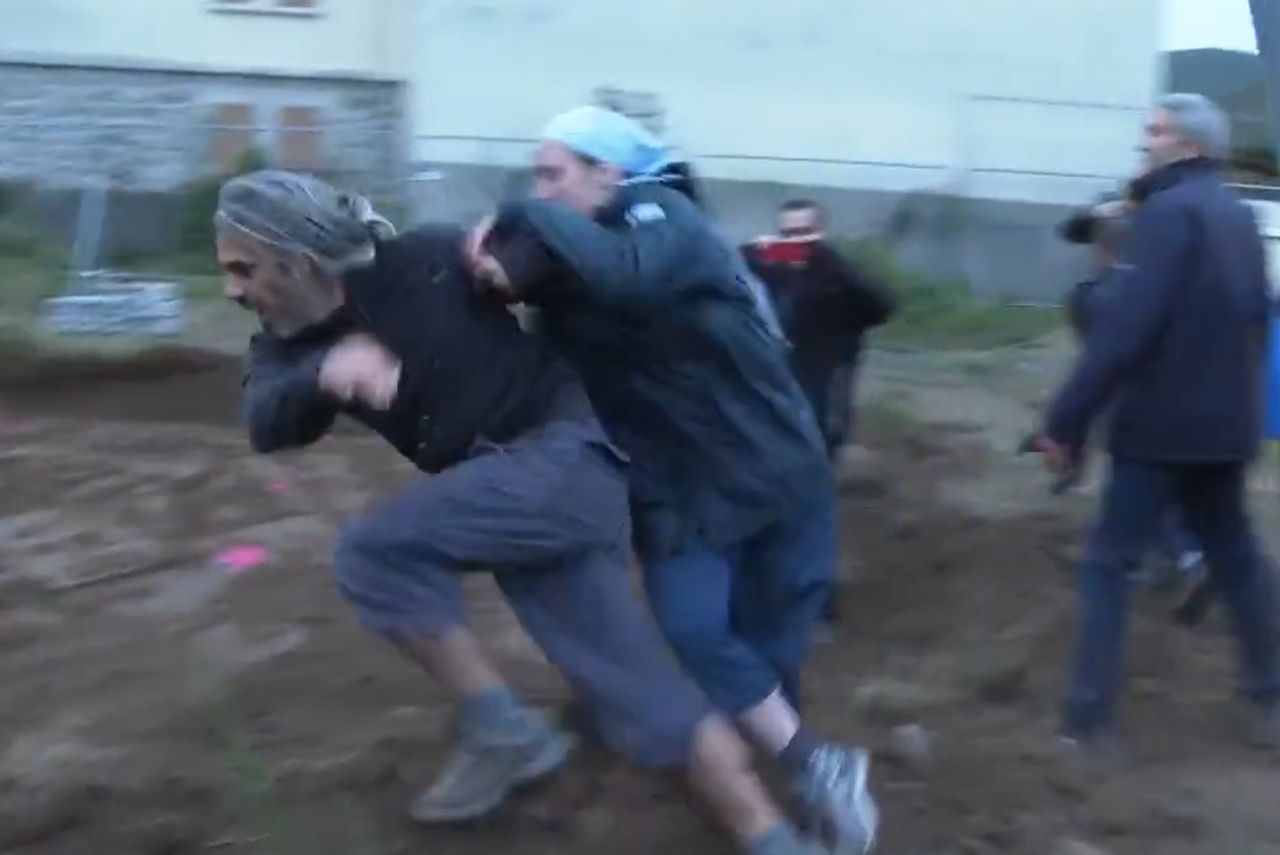 A nun attacking an environmental activist.