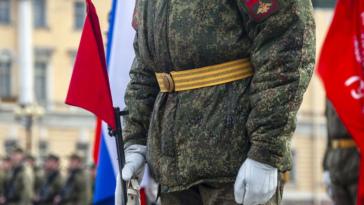 Field military uniform of Russian soldier at parade rehearsal against the background of the colors of the national flag.
Field military uniform of Russian soldier at parade rehearsal against the background of the colors of the national flag. Details of clothing and equipment of an officer with weapon at parade training on Palace Square in St. Petersburg.
Oleg Elagin
training, national