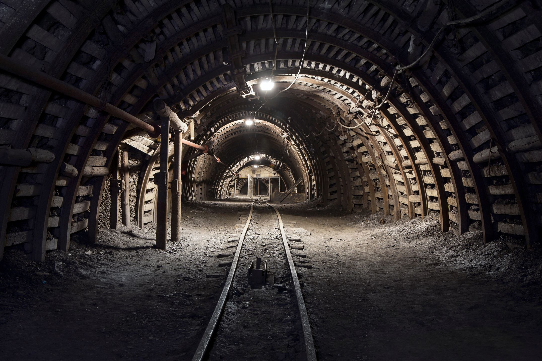 Illuminated, Underground Tunnel in the MinerySopotnickiMining, Coal Mine, Mine, Underground, Spooky, Mine Shaft, Industry, Horror, Tunnel, Cave, Mine Workings, Geology, Engineering, tunneling, Mystery, Indoors, Corridor, Mineral, Rock, Illuminated, Cellar, Underground Walkway, Dark, Poland, Zabrze, Guido, Dungeon, Maze, Wet, Vanishing Point, Science, Horizontal, copy space, rail, railway