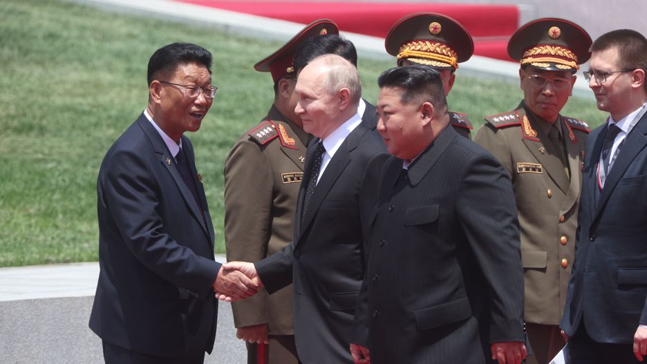 PYONGYANG, NORTH KOREA - JUNE 19: (RUSSIA OUT) Russia's President Vladimir Putin (2L) and North Korean Supreme Leader Kim Jong Un (C) attend a welcoming ceremony, on June 19, 2024, in Pyongyang, North Korea. Russian President Vladimir Putin is in North Korea for a two-day visit. (Photo by Contributor/Getty Images)
