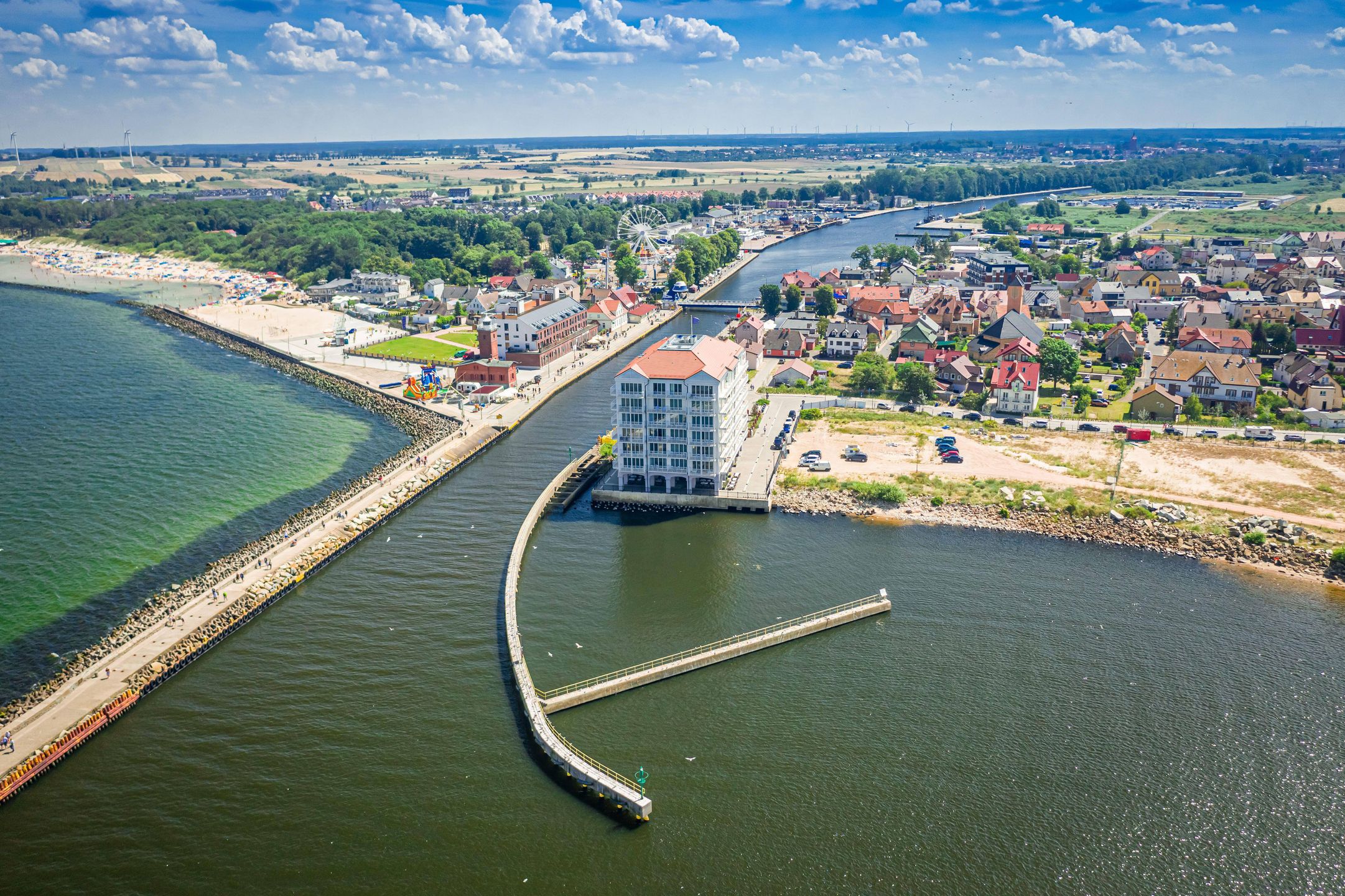 Aerial view of port in Darlowek on Baltic Sea, Poland
2D9TY6C Aerial view of port in Darlowek on Baltic Sea, Poland 
Dostawca: PAP/Alamy
Jacek Nowak / Alamy Stock Photo
above, aerial, aerial, baltic, Ba�tyk, beach, beach, beautiful, blue, coast, coastal, Darlowko, Darlowo, drone, europe, holiday, laguna, landscape, morze ba�tyckie, nature, outdoor, people, pier, poland, polish, sand, scenic, sea, seashore, seaside, shore, sky, summer, sunny, tourism, travel, vacation, view, water, wave