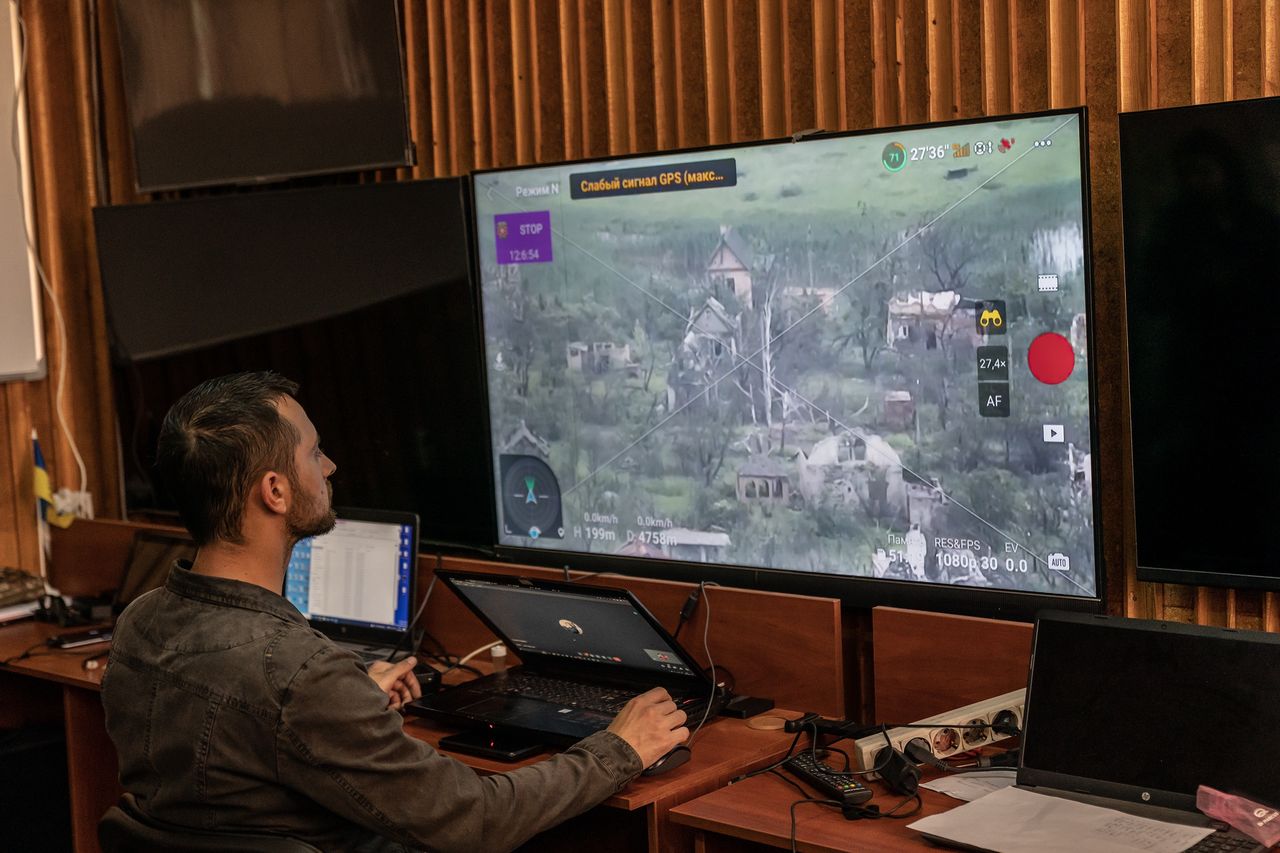 A member of a special Ukrainian military unit operating reconnaissance drones checks the positions of Russian forces on the screen using Starlink technology in an undisclosed location in Donbas.