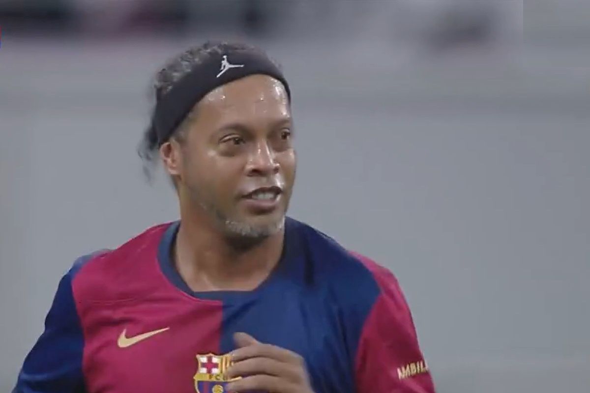 Ronaldinho dazzles again with a stunning free-kick at legends' match