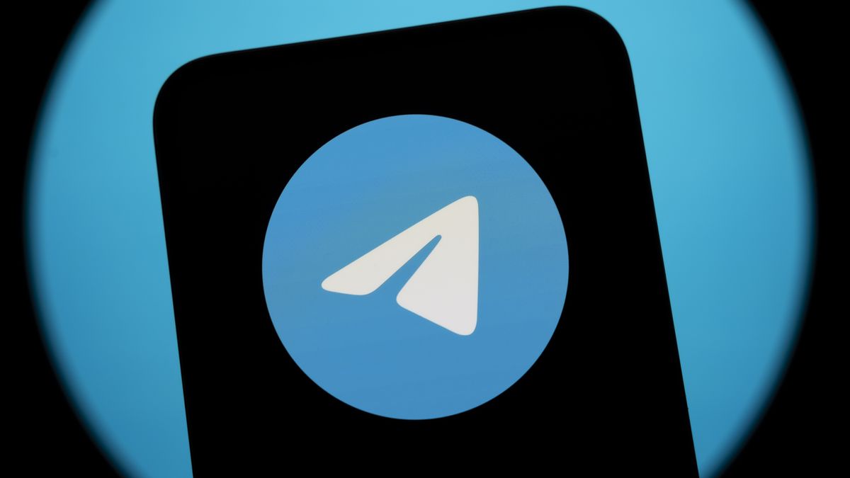 The Telegram logo is displayed on a smartphone with the app's icon in the background. Russian authorities announce the gradual phasing out of access to the messaging app, which they accuse of not blocking enough illegal content. This photo is taken in Creteil, France, on February 11, 2026. (Photo by Samuel Boivin/NurPhoto via Getty Images)