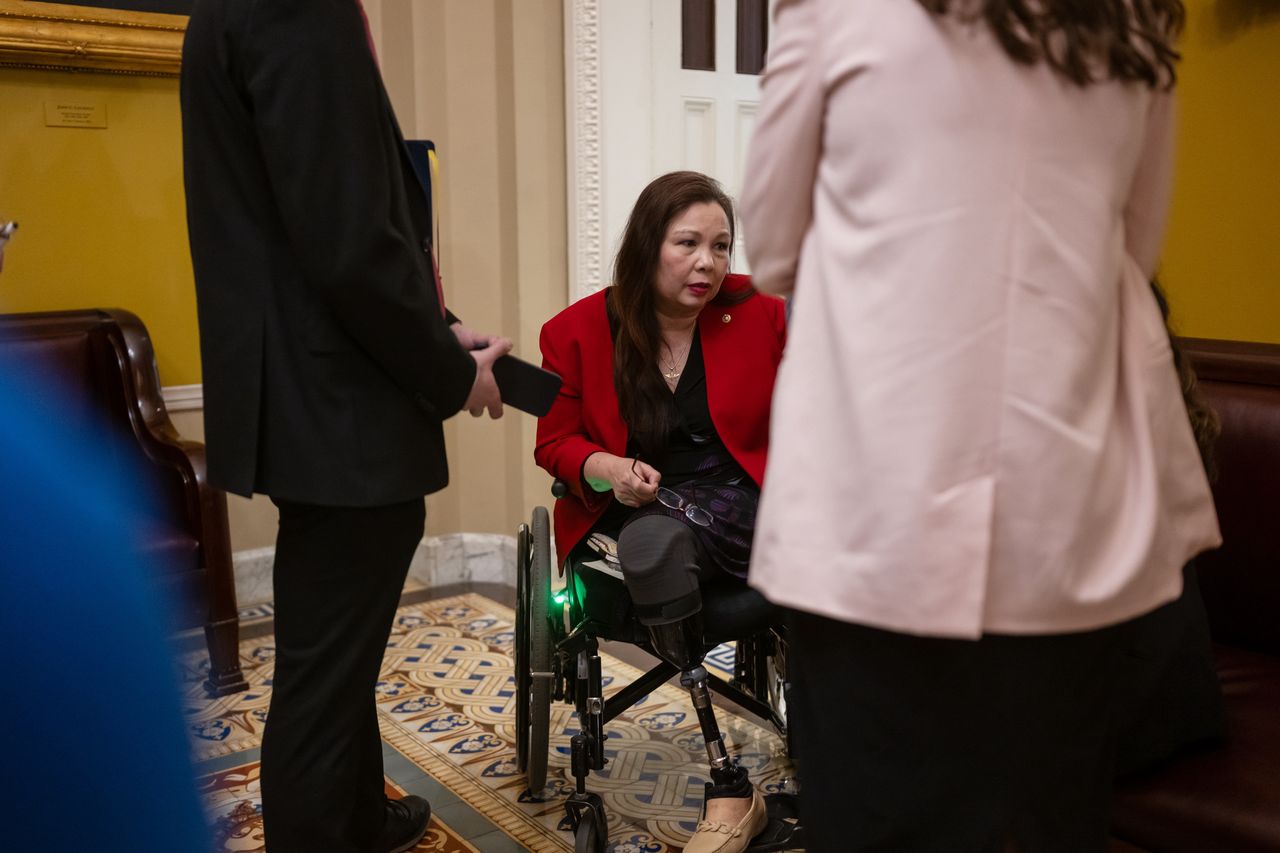 Senator Tammy Duckworth, a Democrat from Illinois, center, at the US Capitol in Washington, DC, US, on Tuesday, Feb. 27, 2024. President Joe Biden on Tuesday stressed the urgency of passing a spending bill to keep agencies open past the March 1 deadline and prodded leaders to approve his request for tens of billions of dollars for Ukraine, Israel and the US-Mexico border, saying the consequences of inaction are "dire." Photographer: Craig Hudson/Bloomberg via Getty Images