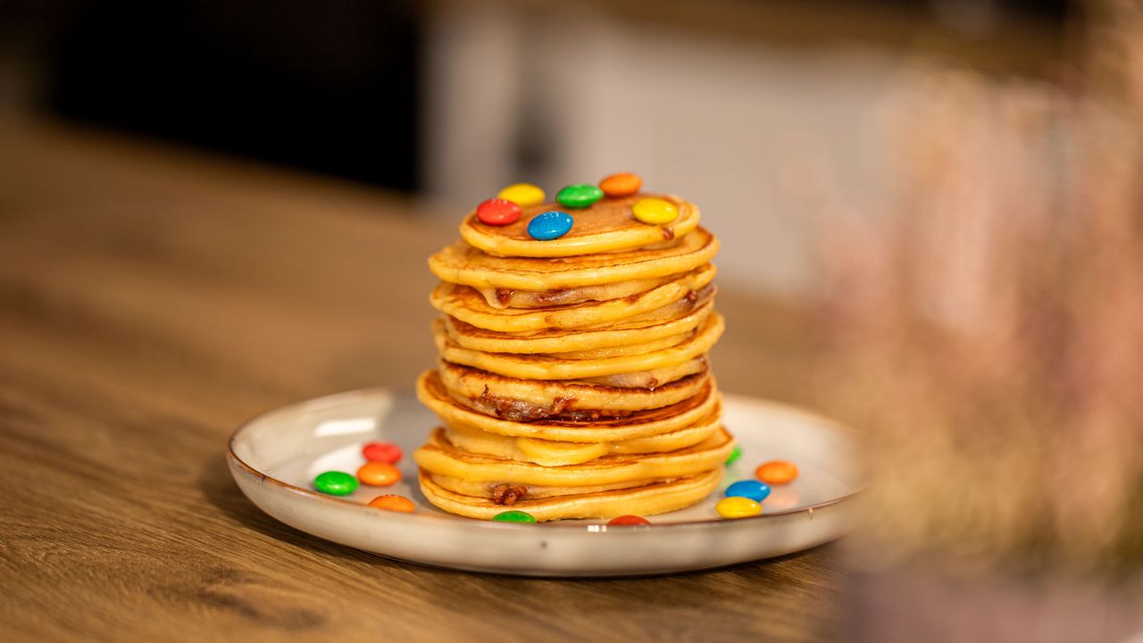 Delicious pancakes with melted chocolate