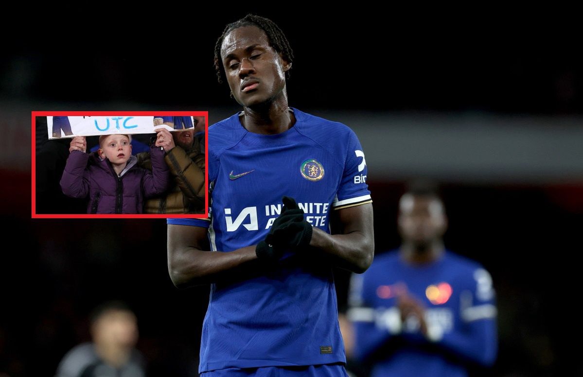 A fan surprised with a banner at the Arsenal vs. Chelsea match.