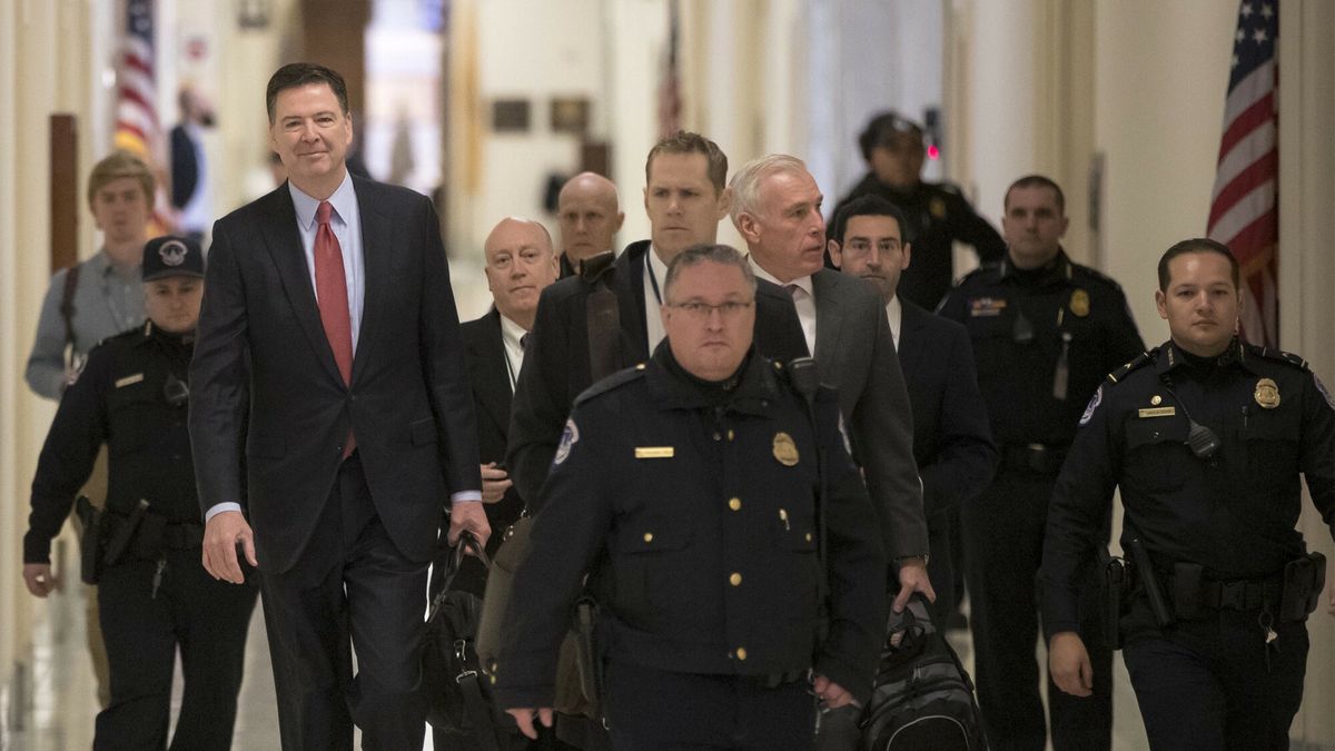 arch33
Former FBI Director James Comey arrives on Capitol Hill in Washington, Monday, Dec. 17, 2018, to testify under subpoena in a second closed-door interview with the GOP-led House Judiciary and Oversight Committees in their probe of conduct by federal law enforcement officials in the investigation of President Donald Trump's alleged Russia ties, and Hillary Clinton's emails,  (AP Photo/J. Scott Applewhite), APTOPIX
AP