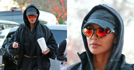 Kim Kardashian człapie na mecz koszykówki w klapkach WARTYCH KROCIE. Ikona stylu? (ZDJĘCIA)