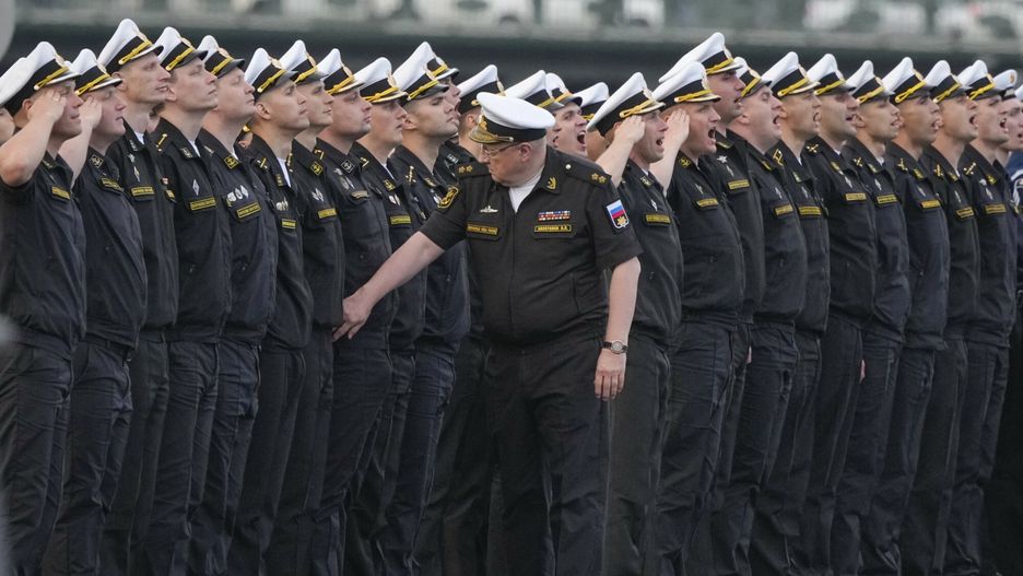 Temporary
Vice-admiral Vladimir Kasatonov checks officers' uniform during a Naval parade rehearsal in St. Petersburg, Russia, Tuesday, July 19, 2022. The celebration of Navy Day in Russia is traditionally marked on the last Sunday of July and will be celebrated on July 31 this year. (AP Photo/Dmitri Lovetsky)
AP