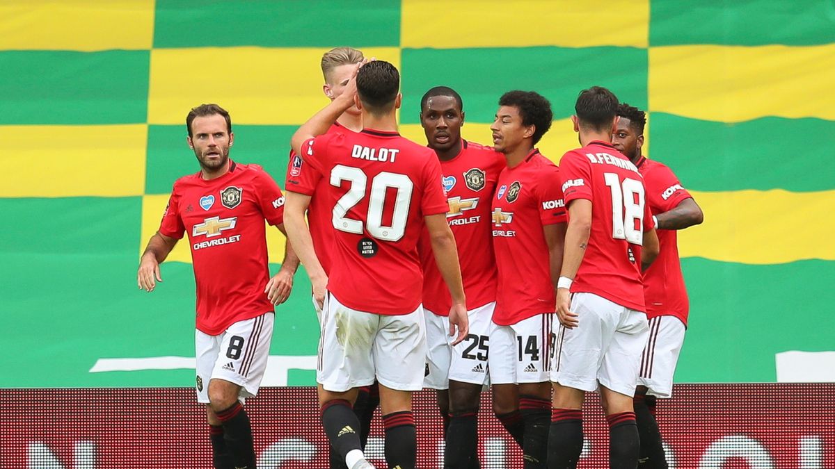 PAP/EPA / Cath Ivill/NMC / Na zdjęciu: piłkarze Manchesteru United