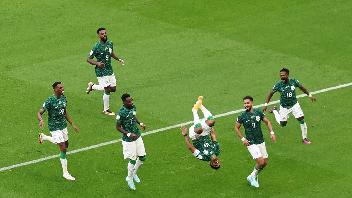 LUSAIL CITY, QATAR - NOVEMBER 22:  Salem Al-Dawsari of Saudi Arabia celebrates after scoring a goal to make it 1-2  during the FIFA World Cup Qatar 2022 Group C match between Argentina and Saudi Arabia at Lusail Stadium on November 22, 2022 in Lusail City, Qatar. (Photo by Matthew Ashton - AMA/Getty Images)