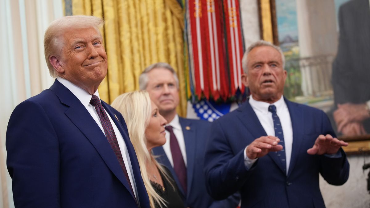 WASHINGTON, DC - FEBRUARY 13: U.S. President Donald Trump smiles as Robert F. Kennedy Jr. delivers remarks after being sworn in as Secretary of Health and Human Services in the Oval Office at the White House on February 13, 2025 in Washington, DC. Kennedy, who faced criticism for his past comments on vaccines, was confirmed by the Senate 52 to 48. Former Senate Republican Leader Mitch McConnell (R-KY) was the only Republican to vote against him.  (Photo by Andrew Harnik/Getty Images)