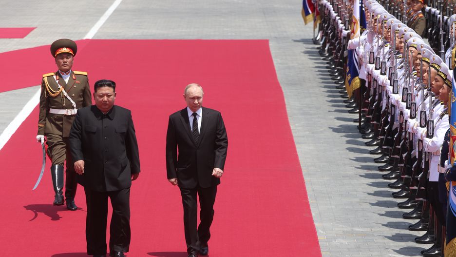 PYONGYANG, NORTH KOREA - JUNE 19: (RUSSIA OUT) Russian President Vladimir Putin (R) and North Korean Supreme Leader Kim Jong Un attend a welcoming ceremony on June 19, 2024 in Pyongyang, North Korea. Russian President Vladimir Putin is in North Korea for a two-day state visit. (Photo by Contributor/Getty Images)