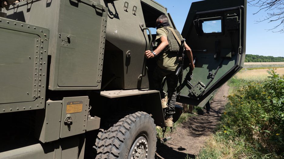 EASTERN UKRAINE , UKRAINE - JULY 1: Kuzia, the commander of the unit, gets inside the HIMARS vehicle in Eastern Ukraine on July 1, 2022. 

(Photo by Anastasia Vlasova for The Washington Post via Getty Images)