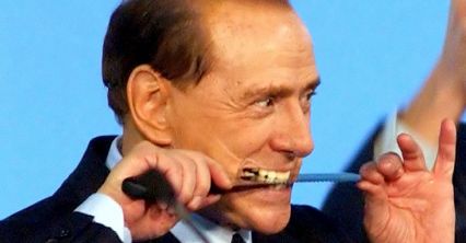Berlusconi w obiektywie fotoreporterów