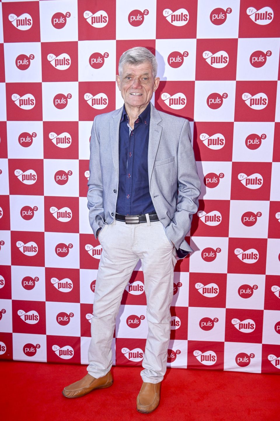 Celebryci pozują na konferencji TV Puls