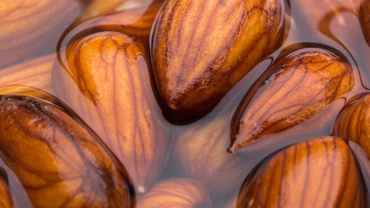 Soaked almonds.Macro of almonds soaked in the water.Boris Zhitkovactivated, phytic