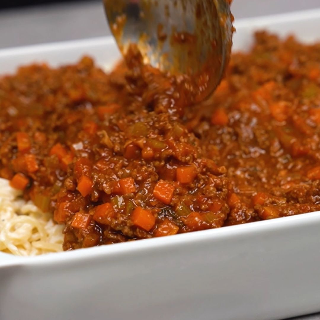 The Bolognese sauce also goes into the mould.