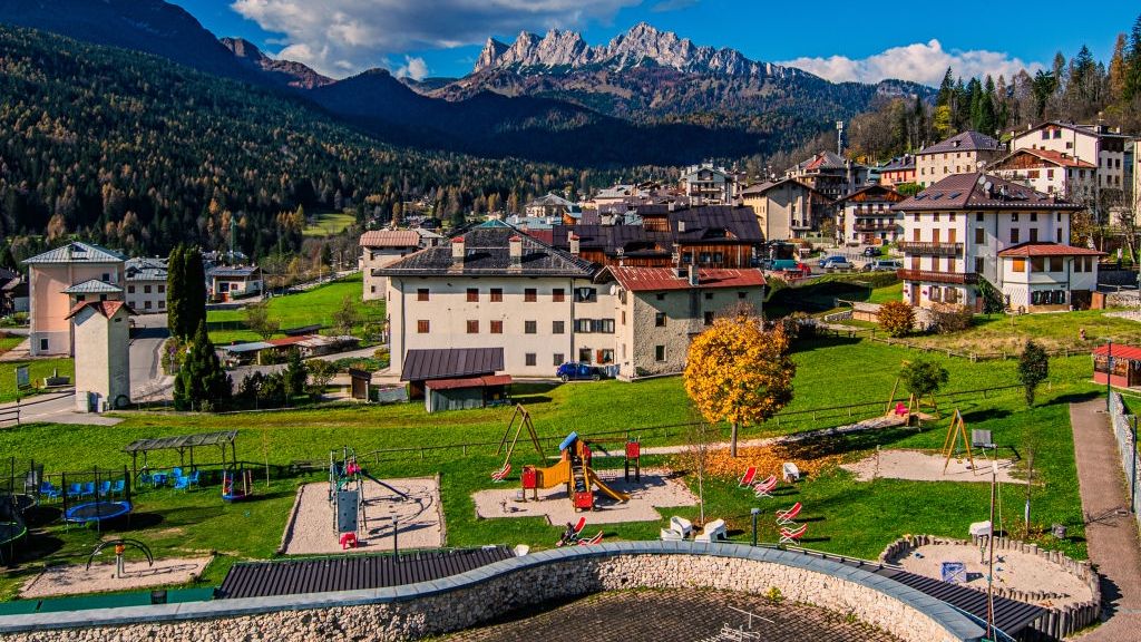 Focus On: The Resilient Communities Of The Dolomites
CORTINA D'AMPEZZO, ITALY - OCTOBER 30:  Inhabitants enjoy the temperate, off-season climate in town, waiting for the arrival of the winter season that will bring tourism, the main activity for the community in Val di Cadore, on October 30, 2024 in Cortina D'ampezzo, Italy. In the UNESCO-listed Dolomites, centuries-old larch trees were cleared for the 2026 Olympic bobsleigh track, sparking environmental concerns in this tourism-driven mountain town. Dolomite communities are increasingly threatened by mass tourism and climate change, which put immense pressure on the region, with data indicating that the Dolomites have experienced an increase in average temperatures of 1.5°C since 1970 and a significant reduction in snow cover, the retreat of glaciers in particular of the Marmolada glacier has reached alarming levels, while tourist hotspots are often crowded with visitors who even last summer were seeking refreshment, and communities are finding and experimenting with adapting to change and investing in sustainable practices for tourism as well. (Photo by Simone Padovani/Getty Images)
Simone Padovani