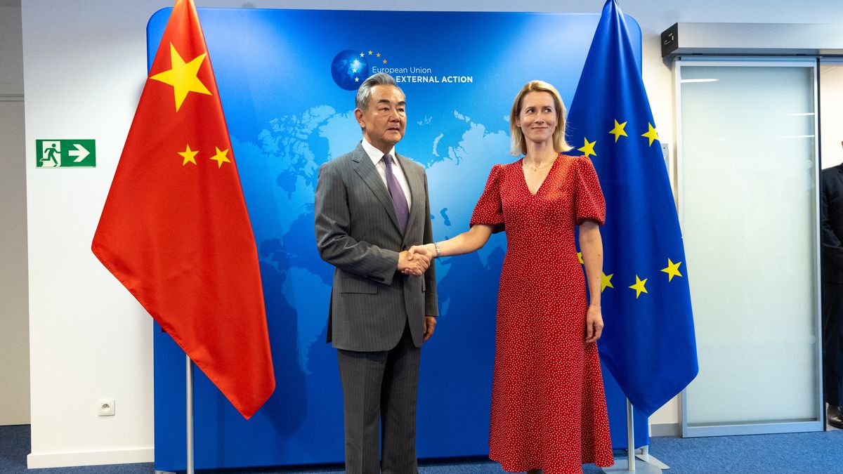 Kaja Kallas, vice president of the European Commission, right, shakes hands with Wang Yi, China's foreign minister, prior to a meeting at the headquarters of the European External Action Service in Brussels, Belgium, on Wednesday, July 2, 2025.  Wang says he hopes Belgium will provide a fair, safe and predictable business environment for Chinese companies, according to a statement from the the country's Ministry of Foreign Affairs. Photographer: Omar Havana/Bloomberg via Getty Images