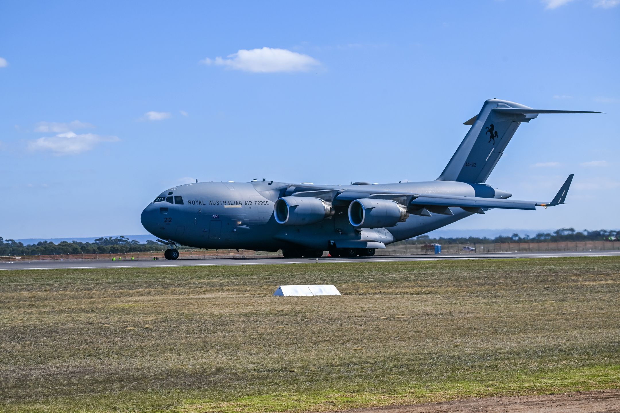 MELBOURNE, AUSTRALIA - 2025/03/25: The McDonnell Douglas/Boeing C-17 is seen on a landing strip at the Avalon Air Show. The Avalon Australian International Airshow 2025 (Avalon 2025) will be the largest in the event's 33-year history. Avalon Airshow is a major event combining Air Force, Defence and Civil aviation industries. It features exhibition, conferences, static displays and flight demonstrations. (Photo by Alexander Bogatyrev/SOPA Images/LightRocket via Getty Images)