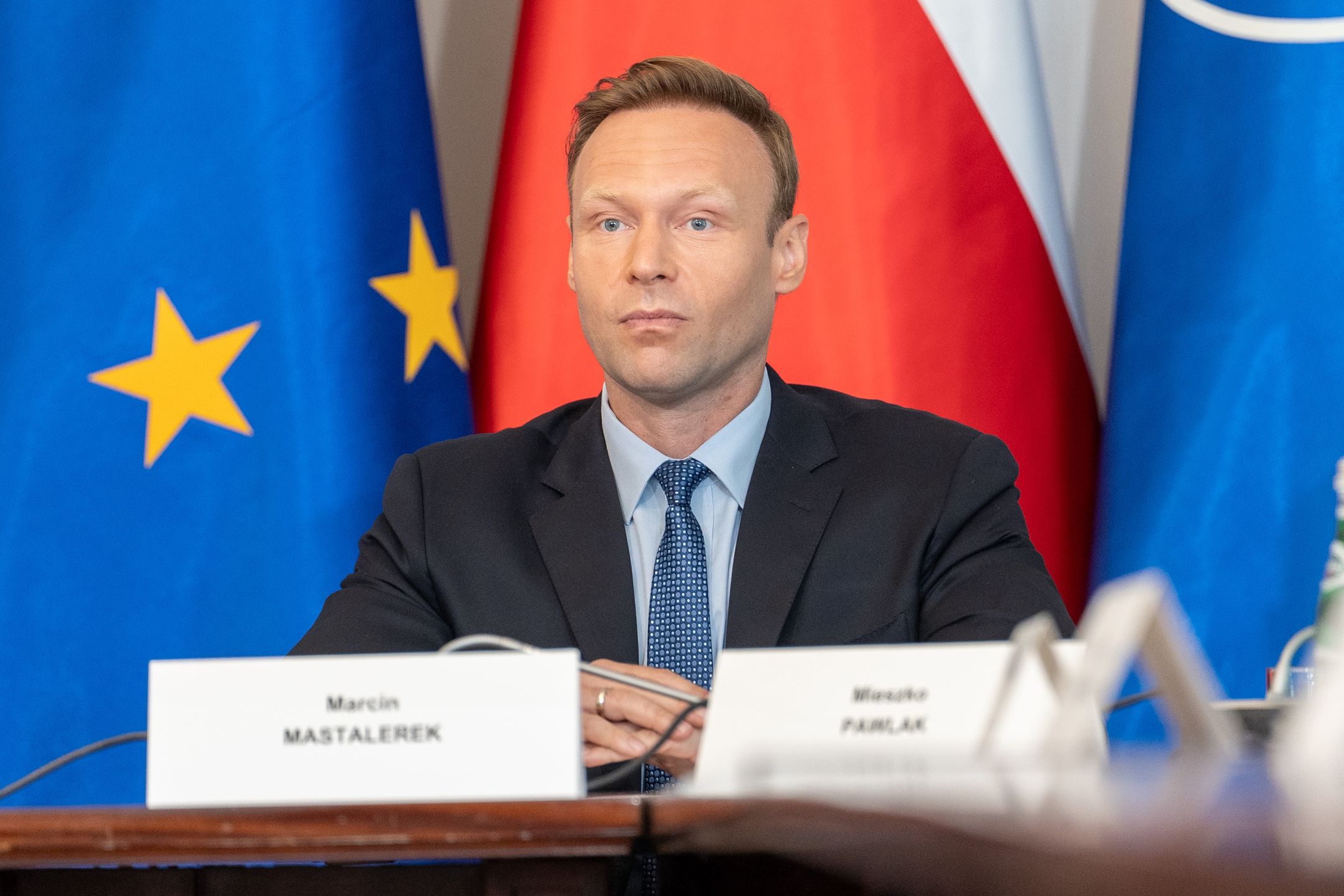 WARSAW, POLAND - 2024/07/08: Marcin Mastalerek - Secretary of State, Chief of the Cabinet of the President of the Republic of Poland listens to Andrzej Duda's speech during the national security council The meeting of the National Security Council convened by President Andrzej Duda began on Monday morning. It takes place before the departure of the Polish delegation to Washington, D.C., for the NATO summit. In the meeting participated, among others, Prime Minister Donald Tusk, Deputy Prime Minister and Minister of National Defense Wladyslaw Kosiniak-Kamysz, Minister of Foreign Affairs Radoslaw Sikorski, Chief of the General Staff General Wieslaw Kukula, Deputy Speakers of the Polish Parliament Wlodzimierz Czarzasty and Piotr Zgorzelski, Speaker of the Senate Malgorzata Kidawa-Blonska, Chairman of the PiS club, former Minister of National Defense Mariusz Blaszczak, Head of the Chancellery of the Prime Minister Jan Grabiec, and Head of the Chancellery of the President Malgorzata Paprocka. (Photo by Marek Antoni Iwanczuk/SOPA Images/LightRocket via Getty Images)