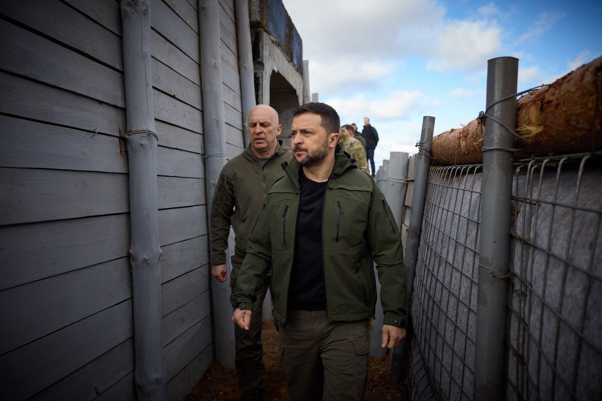 DONETSK, UKRAINE - APRIL 19: (----EDITORIAL USE ONLY - MANDATORY CREDIT - 'PRESIDENCY OF UKRAINE / HANDOUT' - NO MARKETING NO ADVERTISING CAMPAIGNS - DISTRIBUTED AS A SERVICE TO CLIENTS----) President of Ukraine Volodymyr Zelenskyy (front) meets with the Head of the Donetsk Regional Military Administration, Vadym Filashkin (rear) in Donetsk Region, Ukraine on April 19, 2024. Filashkin, reported on the elimination of the consequences of Russian shelling and the restoration of water supply in the settlements. He also spoke about ensuring educational activities in the region and the construction of school shelters. (Photo by Presidency of Ukraine/Anadolu via Getty Images)