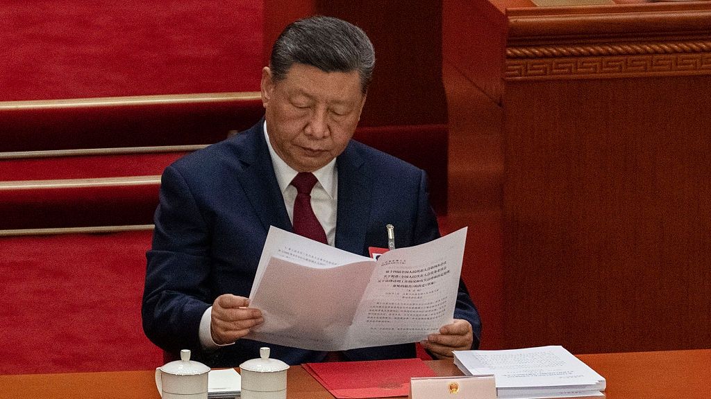 China Holds Annual Two Sessions Political Meetings-NPC
BEIJING, CHINA - MARCH 12: Chinese President Xi Jinping reads as he follows along during voting at the closing session of the National People's Congress at the Great Hall of the People on March 12, 2026 in Beijing, China. China's annual political gatherings, which includes the National People's Congress (NPC) and the Chinese People's Political Consultative Conference (CPPCC), and is known as the Two Sessions, convenes leaders and lawmakers to set the government's agenda for domestic economic and social development for the year. The gathering closed on March 12th. (Photo by Kevin Frayer/Getty Images)
Kevin Frayer