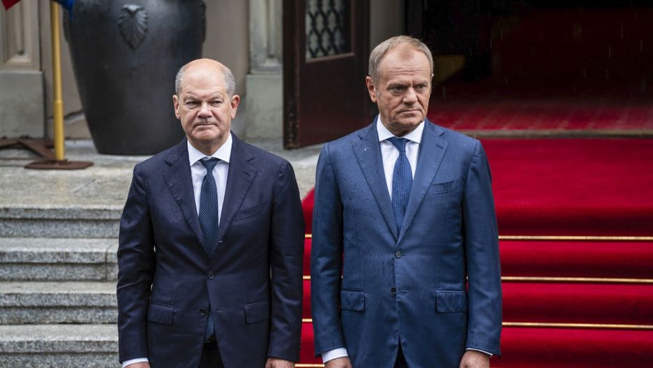 Donald Tusk and Olaf Scholz present in Poland for Polish-German intergovernmental consultations
WARSAW, POLAND - JULY 02: Poland's Prime Minister, Donald Tusk (R) and Germany's Chancellor, Olaf Scholz (L) present at the welcome ceremony ahead of a Polish-German intergovernmental consultations at the Chancellery of the Prime Minister on July 02, 2024 in Warsaw, Poland. The long-expected visit is the first one Polish-German governmental consultations in years and indicates new, closer cooperation between the two countries amidst regional security concerns following Russia-Ukraine war, migration crisis and more. (Photo by Magdalena Chodownik/Anadolu via Getty Images)
Anadolu
band, official ceremony, migration, political, eu, pm, sholz