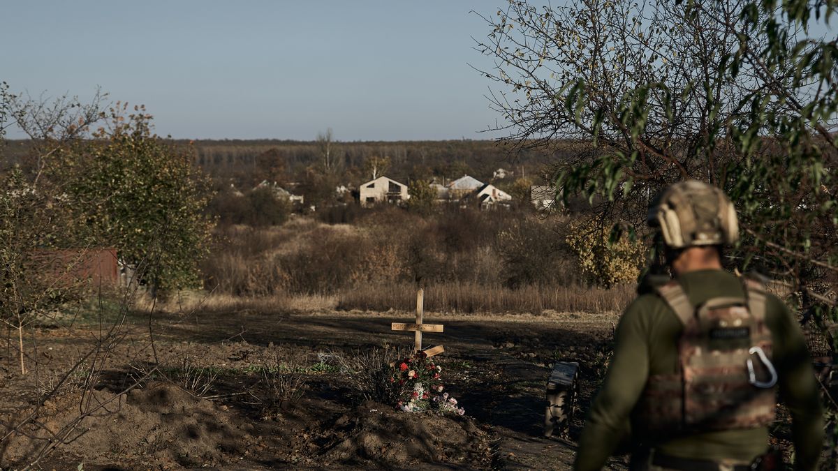 AVDIIVKA, UKRAINE - OCTOBER 30: Tombstone of one of two residents hit by a small guided missile on October 30, 2023 in Avdiivka, Ukraine. The National Police of Ukraine, along with the "White Angel" special unit, is conducting an operation to evacuate the remaining local residents from the city, which faces daily destruction from artillery fire. According to the national police, approximately 1,400 people are still in the city. The fighting has escalated in recent days following Russia's major offensive earlier this month. (Vlada Liberova / Libkos via Getty Images)