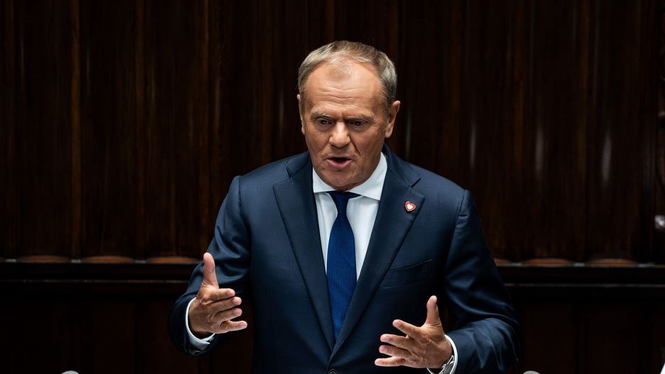 Donald Tusk, Poland's prime minister, speaks in Parliament ahead of a vote of confidence in Warsaw, Poland, on Wednesday, June 11, 2025. Tusk said he'd reshuffle his government in July, defending his record in power as he sought to rally his ruling coalition ahead of the confidence vote in parliament. Photographer: Damian Lemanski/Bloomberg via Getty Images